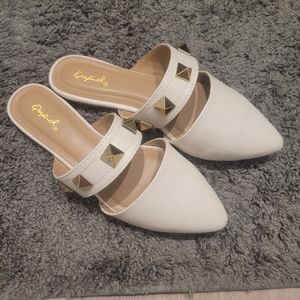 Cream studded shoes